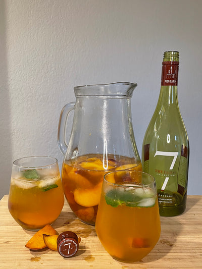 Embrace the Summer Breeze with our Farm Chardonnay Peach Sangria